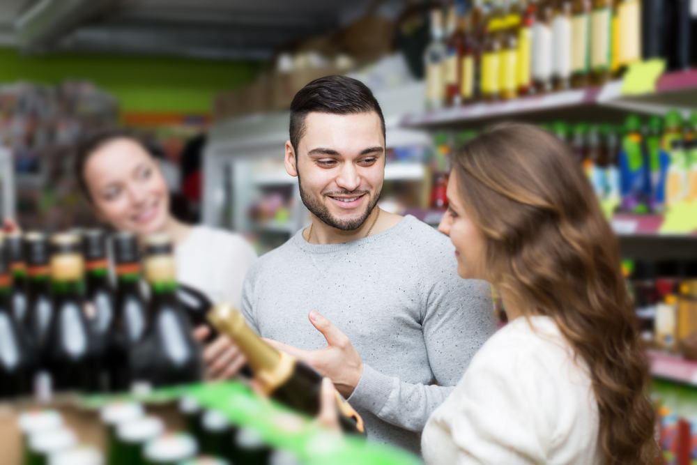 Customers buying liquor at Golden Hill Market